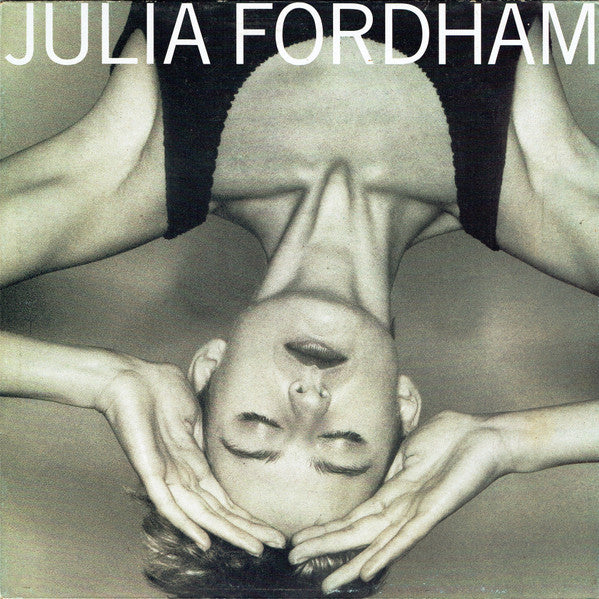 Album cover with a black and white photo of a person lying on their back with hands supporting their head, and 'Julia Fordham' text at the top.