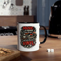 A white ceramic coffee mug with a black handle and interior, featuring a graphic print that reads 'MUSIC IS CHEAPER THAN THEORY.