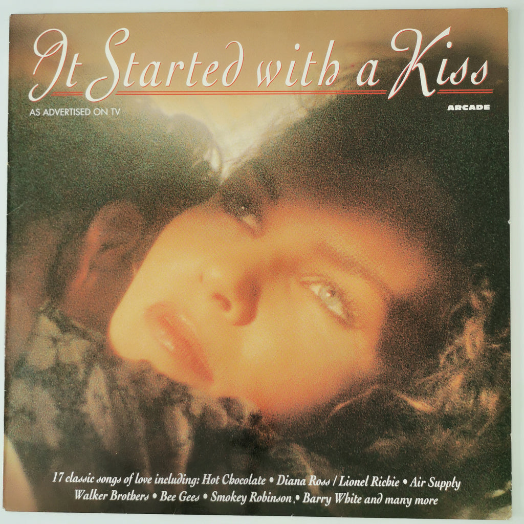 Vinyl record cover for 'It Started with a Kiss' by Arcade, featuring a close-up portrait of a woman with dark curly hair against a warm brown and orange-toned background.